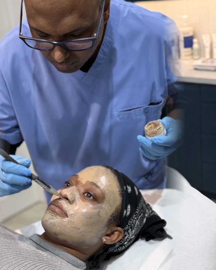 Dr Nick applying a chemical peel to a patient’s face at Rejuvena Clinic, Bedford
