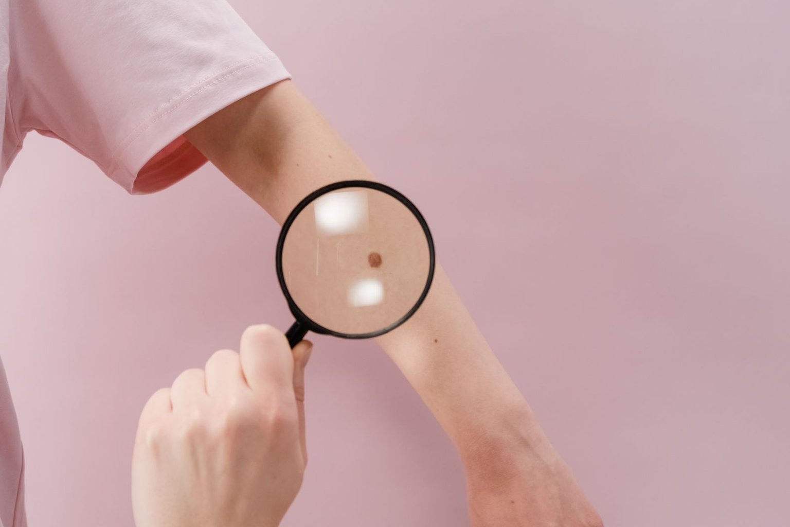 Close examination of skin under magnification — the doctor-led diagnostic approach used to identify what's actually driving uneven skin tone, Rejuvena Clinic Bedford