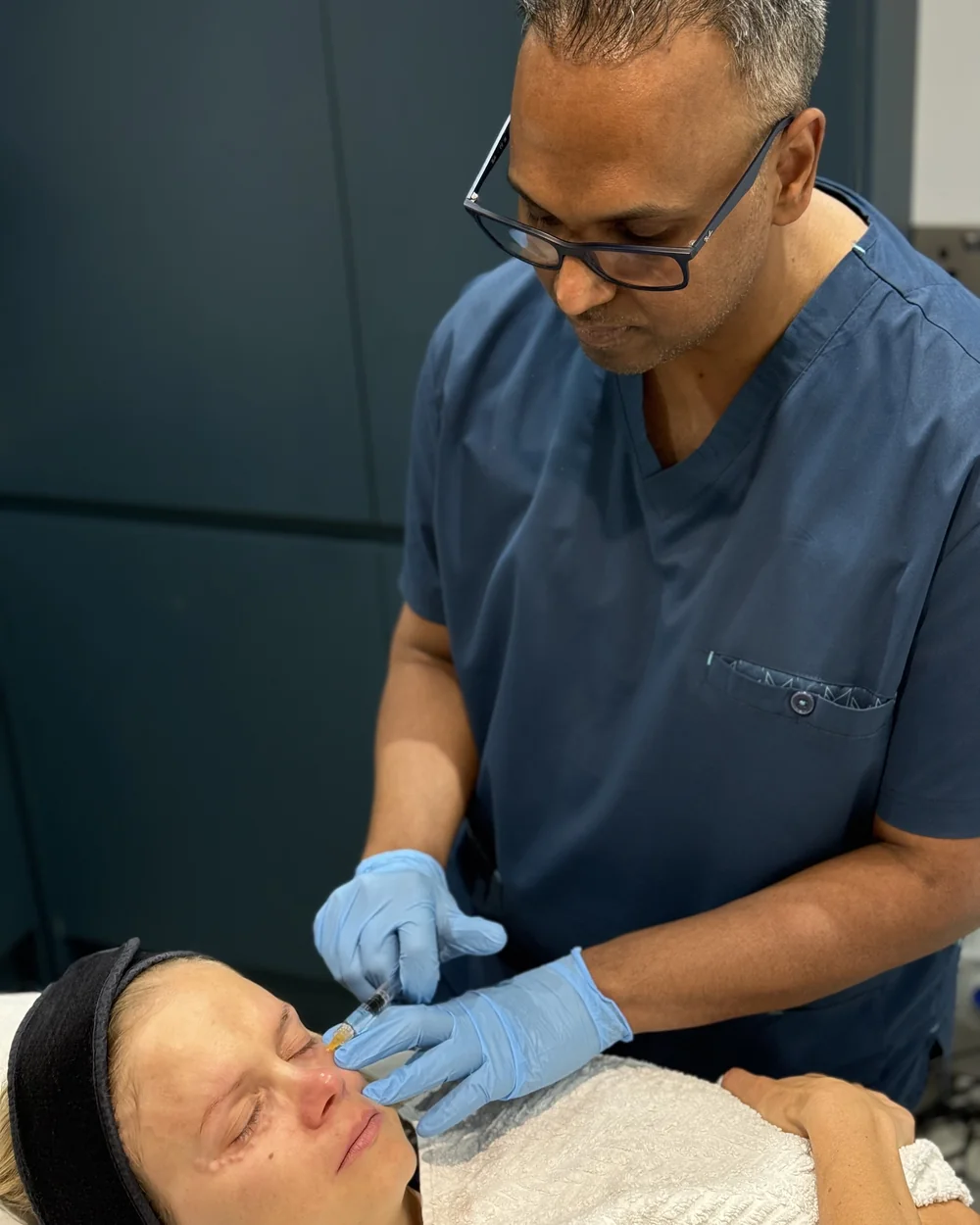 Dr Nick performing a polynucleotide skin-booster injection at Rejuvena Clinic, Bedford