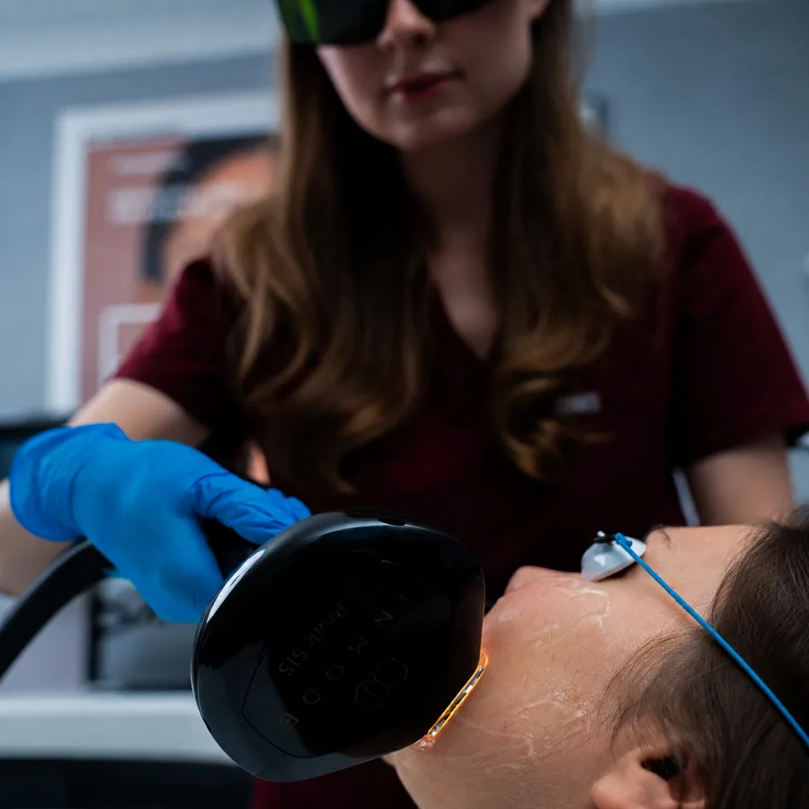 Lumecca IPL photofacial being carried out on a patient wearing protective eyewear at Rejuvena Clinic in Bedford